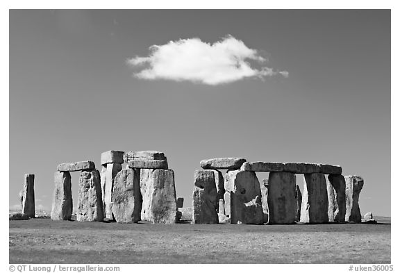 Stone circle and isolated cloud, Stonehenge, Salisbury. England, United Kingdom (black and white)