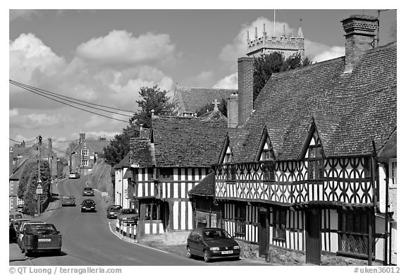 Village main street lined with half-timbered houses. Wiltshire, England, United Kingdom (black and white)