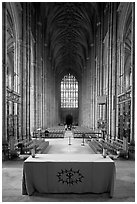 Altar, soaring arches of the Nave, and stained glass, Canterbury Cathedral. Canterbury,  Kent, England, United Kingdom (black and white)