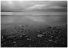 Pebbles, beach, and Katchemak Bay. Homer, Alaska, USA (black and white)