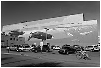 Parking lot with whale mural in background. Anchorage, Alaska, USA ( black and white)