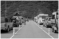 Cars and RVs lining up for the tunnel crossing. Whittier, Alaska, USA (black and white)