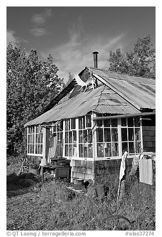 House with antlers and american flag. McCarthy, Alaska, USA (black and white)