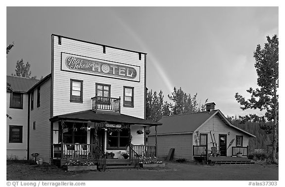 Ma Johnson  hotel and rainbow. McCarthy, Alaska, USA (black and white)