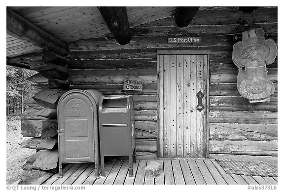 Mail boxes, log house post office, Slana. Alaska, USA (black and white)