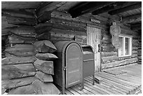 Mail boxes, log house postal office, Slana. Alaska, USA (black and white)