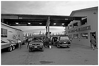 Cars and Rv at gas station The Hub of Alaska, Glennalen. Alaska, USA (black and white)