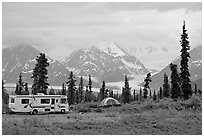 RV, tent, with glacier and mountains in background. Alaska, USA (black and white)