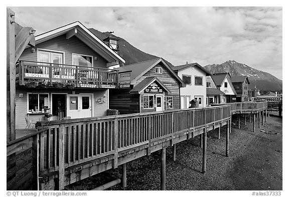 Waterfront houses on harbor. Seward, Alaska, USA (black and white)