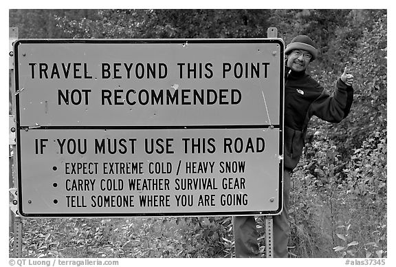 Sign with warnings about winter travel, Exit Glacier Road. Seward, Alaska, USA