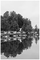 Seaplanes on the shore of Lake Hood, the largest sea plane base in the world. Anchorage, Alaska, USA (black and white)