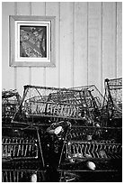 Fishing baskets and wall. Kotzebue, North Western Alaska, USA (black and white)