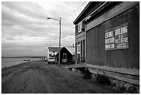 Eskimo building and US Post office on Shore avenue. Kotzebue, North Western Alaska, USA (black and white)