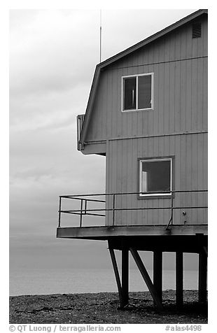 House on stilts on the Spit. Homer, Alaska, USA (black and white)