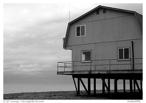 Watefront house on stilts on the Spit. Homer, Alaska, USA (black and white)