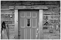 Wooden cabin door. Ninilchik, Alaska, USA ( black and white)