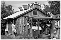 Wooden cabin in old  village. Ninilchik, Alaska, USA ( black and white)