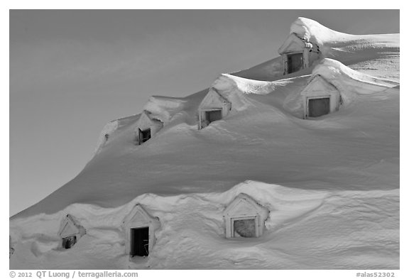 Snow-covered roof with windows. Alaska, USA (black and white)