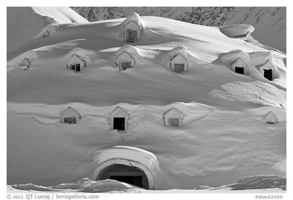 Snow-covered igloo-shaped building. Alaska, USA
