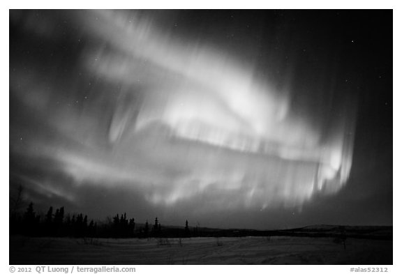 Magnetic storm in sky above snowy meadow. Alaska, USA (black and white)