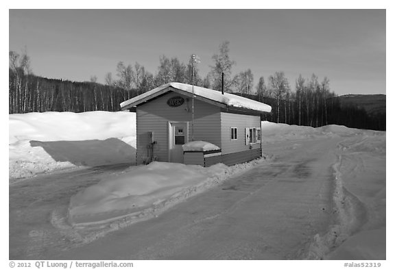 Drive-in coffee shop in isolated winter landscape. Alaska, USA (black and white)