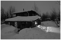 Log cabin at night. Wiseman, Alaska, USA ( black and white)