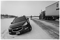 Car stuck in snow along Dalton Highway. Alaska, USA (black and white)