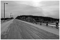 Long wooden bridge across Yukon River. Alaska, USA (black and white)