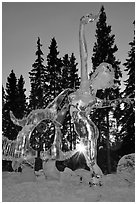 Sun setting over ice sculpture, World Ice Art Championships. Fairbanks, Alaska, USA ( black and white)