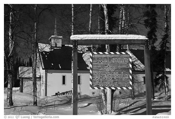 Welcome sign and church. North Pole, Alaska, USA (black and white)