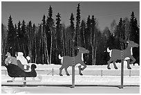 Santa Claus and reinder cut-out in winter. North Pole, Alaska, USA (black and white)