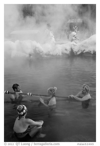 People with frozen hair relaxing in hot springs. Chena Hot Springs, Alaska, USA