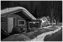 Cabins at night in winter. Chena Hot Springs, Alaska, USA ( black and white)