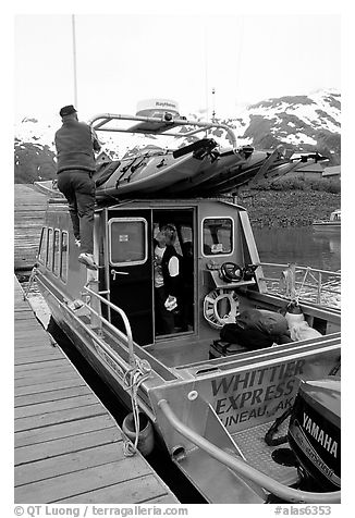 Kayaks loaded on a water taxi in Whittier. Whittier, Alaska, USA (black and white)