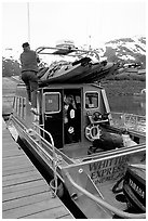 Kayaks loaded on a water taxi in Whittier. Whittier, Alaska, USA (black and white)