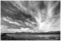 Clouds, tundra and lake along Denali Highway. Alaska, USA (black and white)