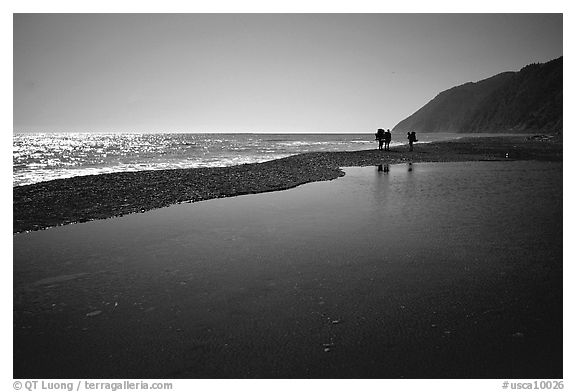 Pool and hikers, Lost Coast. California, USA (black and white)