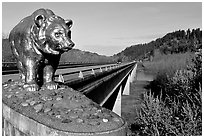 Golden bear adorning a bridge over the Klamath River. California, USA (black and white)