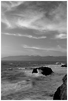 Surf and rocks at sunset seen from the Cliff House. San Francisco, California, USA (black and white)