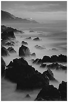 Rocks and surf at Blue hour, dusk, Garapata State Park. Big Sur, California, USA ( black and white)
