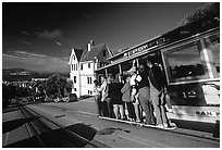 Cable car and Tudor house, Hyde Street, late afternoon. San Francisco, California, USA ( black and white)