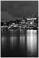 Lights of Ghirardelli Square sign reflected in Aquatic Park. San Francisco, California, USA (black and white)
