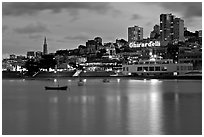 Aquatic Park, Ghirardelli Square, and skyline at dusk. San Francisco, California, USA (black and white)