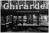 Ghirardelli chocolate store at dusk, Ghirardelli Square. San Francisco, California, USA (black and white)