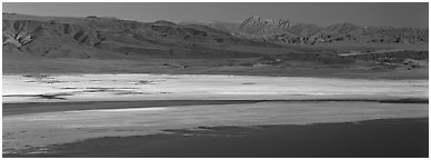 Desert landscape with Owens Lake and mountains. California, USA (Panoramic black and white)