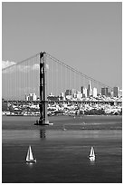 Sailboats, Golden Gate Bridge with city skyline, afternoon. San Francisco, California, USA (black and white)