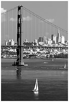Sailboat, Golden Gate Bridge, and  city skyline, afternoon. San Francisco, California, USA (black and white)