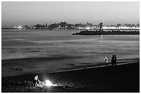 Beach campfire at sunset. Santa Cruz, California, USA (black and white)