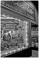Chocolate store on Columbus Avenue at night, North Beach. San Francisco, California, USA (black and white)