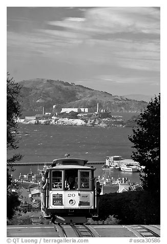 Cable car and Alcatraz Island, late afternoon. San Francisco, California, USA (black and white)
